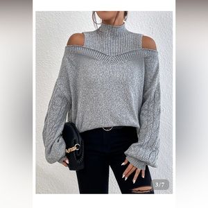 Cable knit long sleeve turtleneck sweater